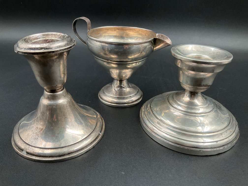 Two Weighted Sterling Candlesticks & Creamer
