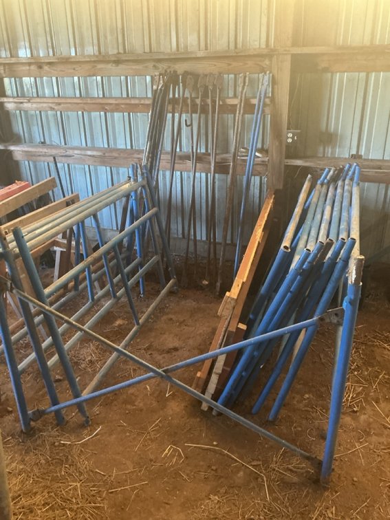 Steel Tubular Frame Scaffolding Units with Cross Braces and Wooden Walkboards