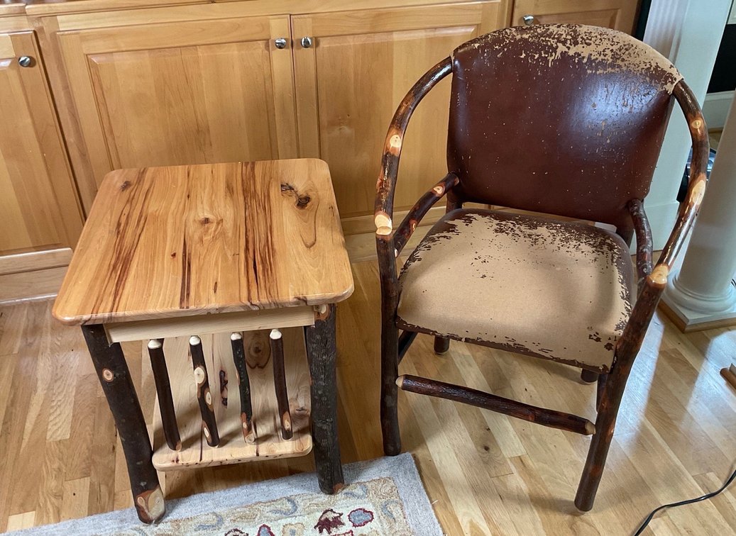 Rustic Hickory Log End Table with Lower Shelf and Armchair
