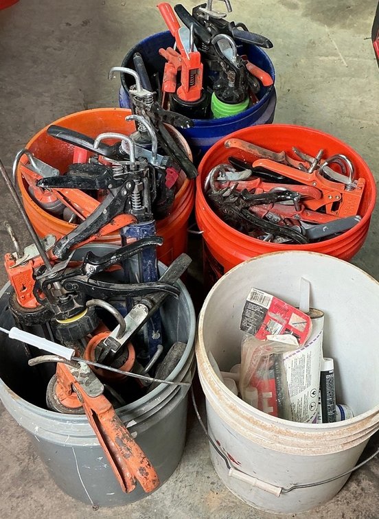 Large Lot of Manual Caulking Guns with Adhesive Cartridges
