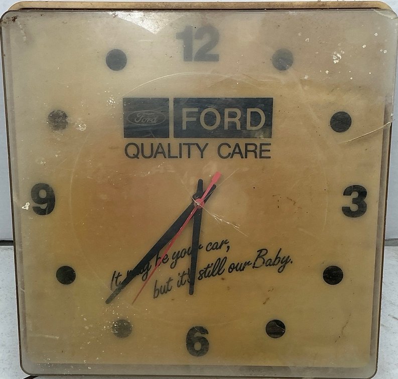 Ford Quality Care Wall Clock