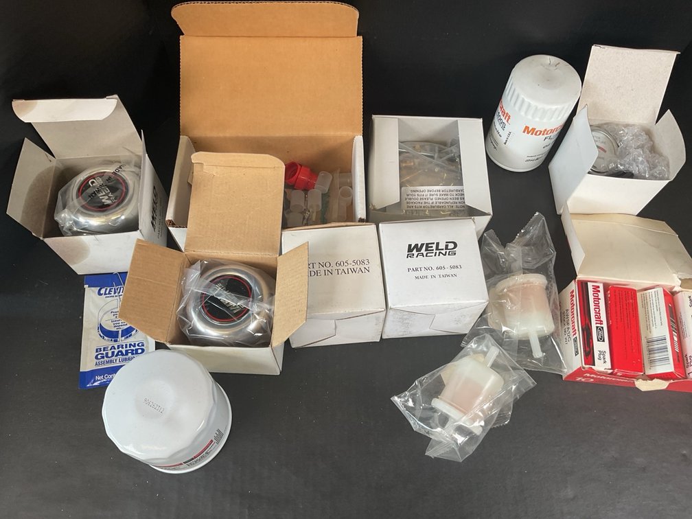 Assortment Of Automotive Maintenance Parts And Filters