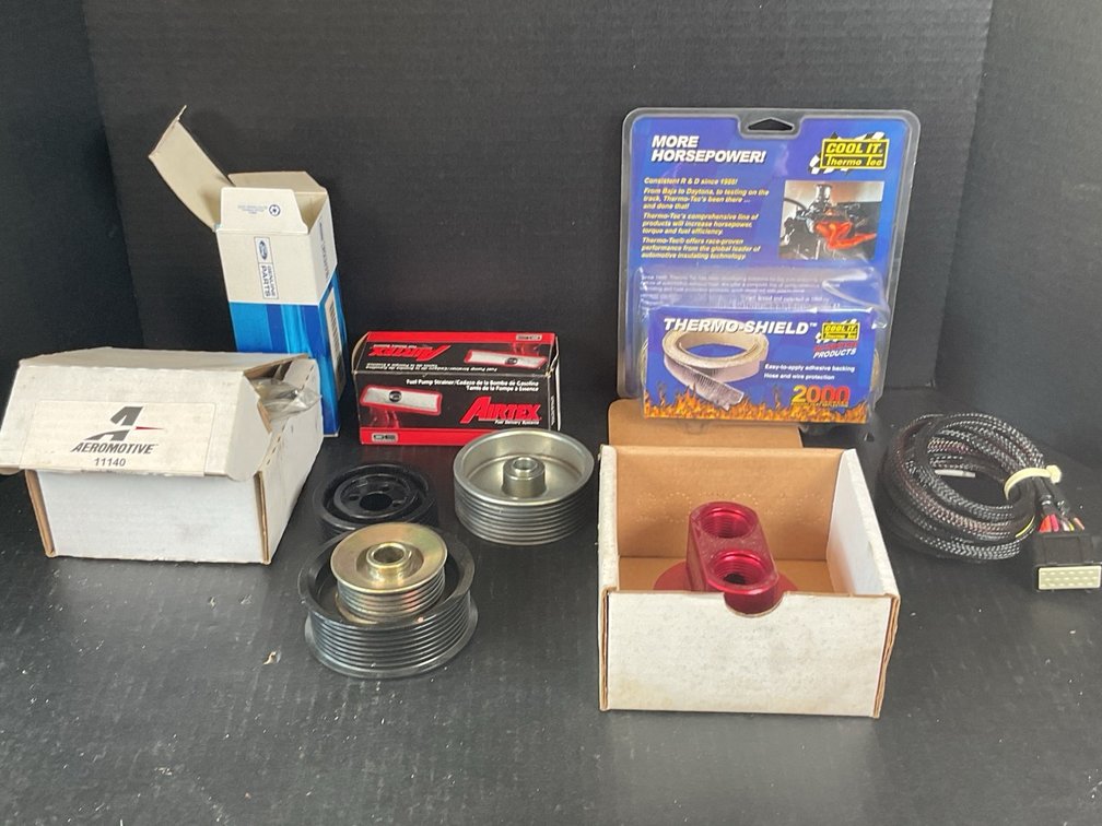 Assortment Of Automotive Performance Parts And Electrical Parts