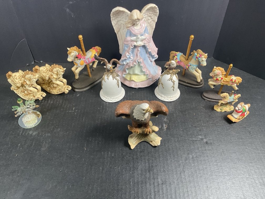Assorted Decorative Figurine Lot Including Carousel Horses Eagle and Angel