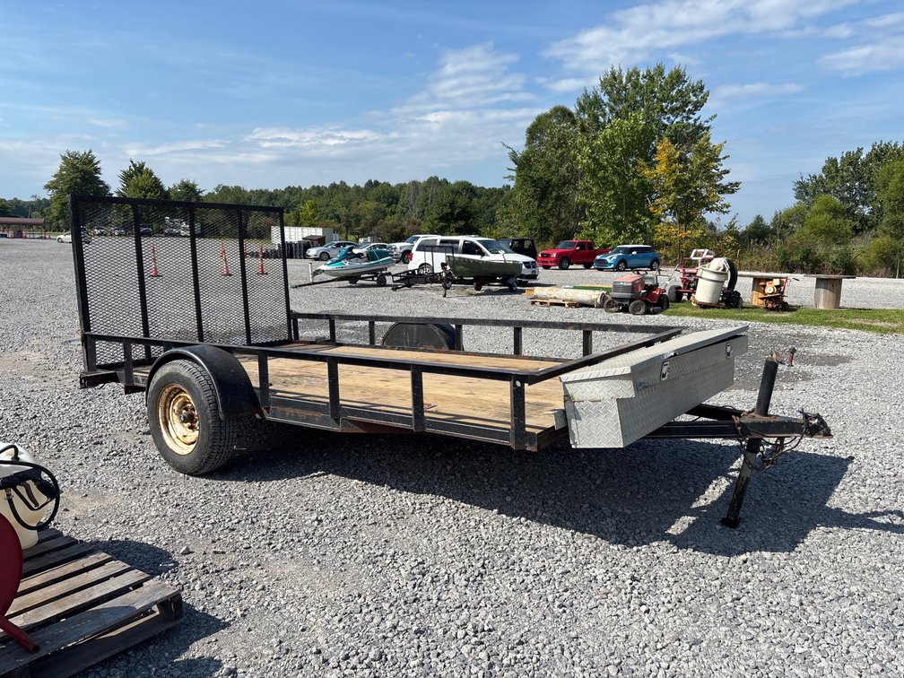 12.5’ single axle trailer with fold down ramp & tool box