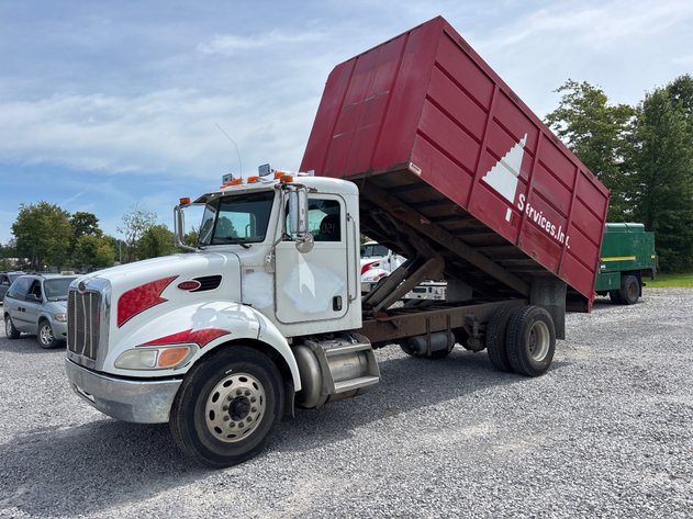 Image for 2009 Peterbilt 335 Truck w/ 16’ Schodorf dumping chip body