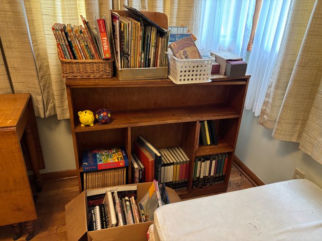 Image for Wooden Bookcase with Books, Games, and Piggy Banks