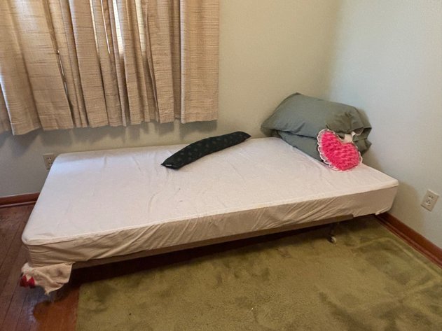 Image for Twin Mattress on Metal Frame with Bedding and Pillows
