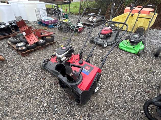 Image for D1. Centura push mower and toro powerlite snow thrower