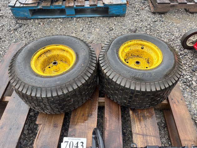 Image for D1. (2) used tractor tires on wheels