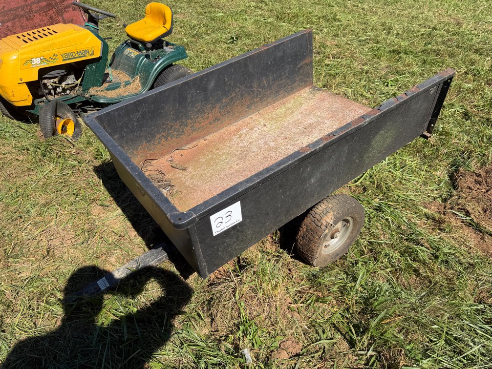 Yard utility trailer with dump