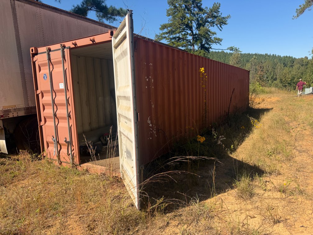 Shipping container and contents. 40 ft
