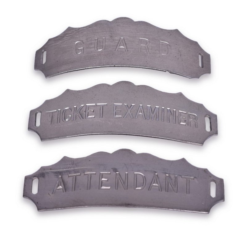 Three Railroad Cap Badges - "Ticket Examiner", "Attendant", "Guard"
