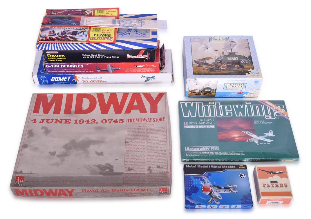 Collection of Thirteen Aviation Items - Midway Naval-Air Battle Game, Balsa Gliders, Paper Airplanes, Metal Model, and Puzzle
