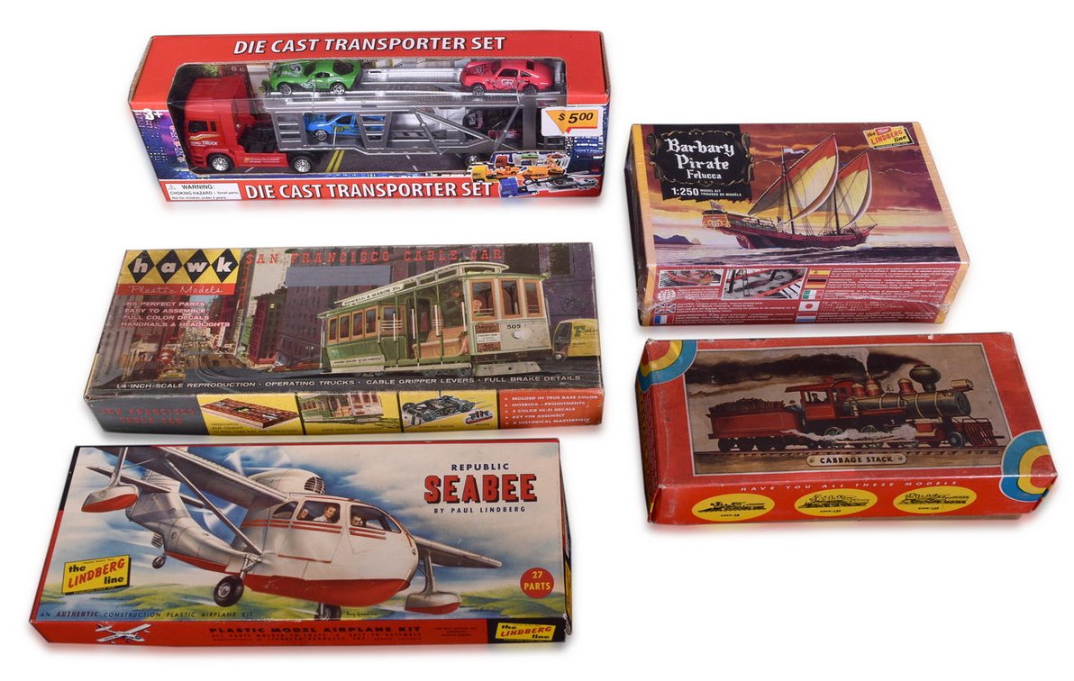 Four Assorted Plastic Model Kits - Northwestern Cabbage Stack Locomotive, Hawk Cable Car, Lindberg Seabee, and Lindberg Barbary Pirate