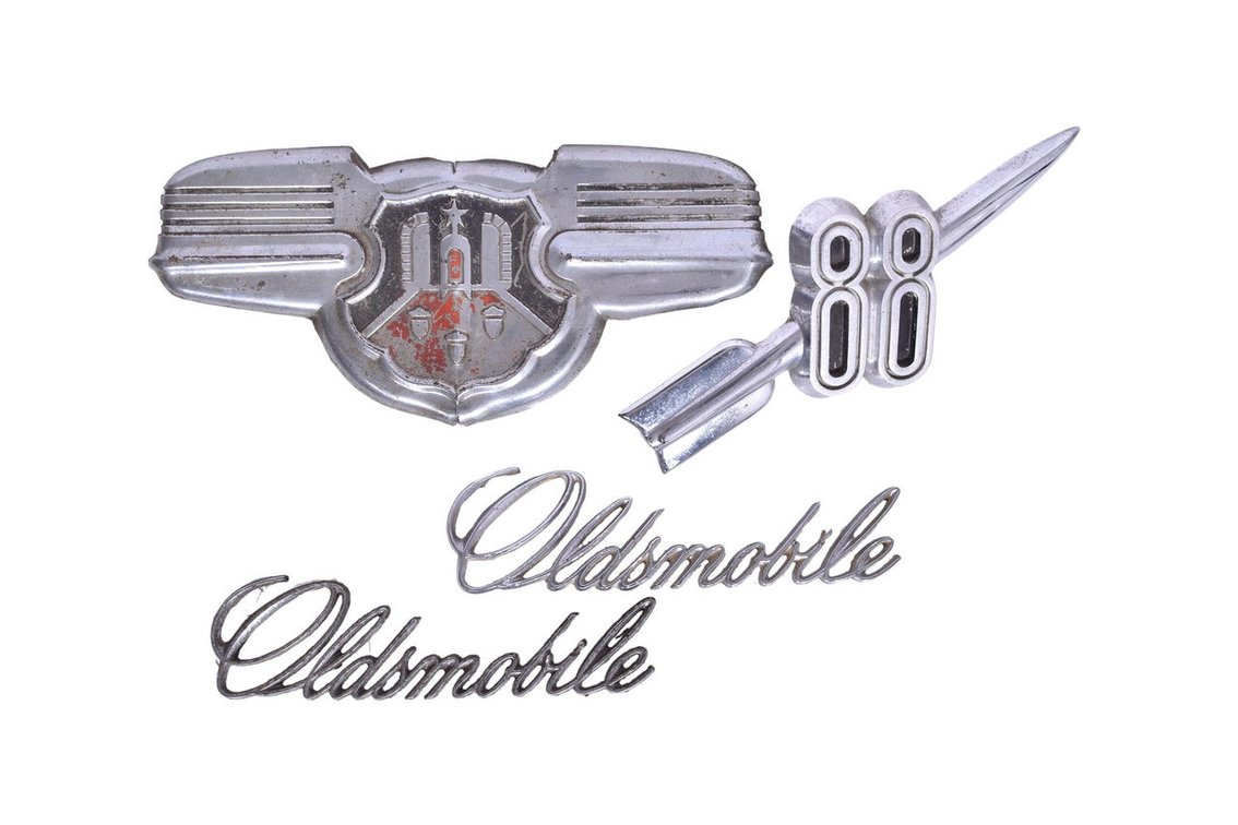 Group of Four Oldsmobile Car Hood / Trunk Emblems and Scripts