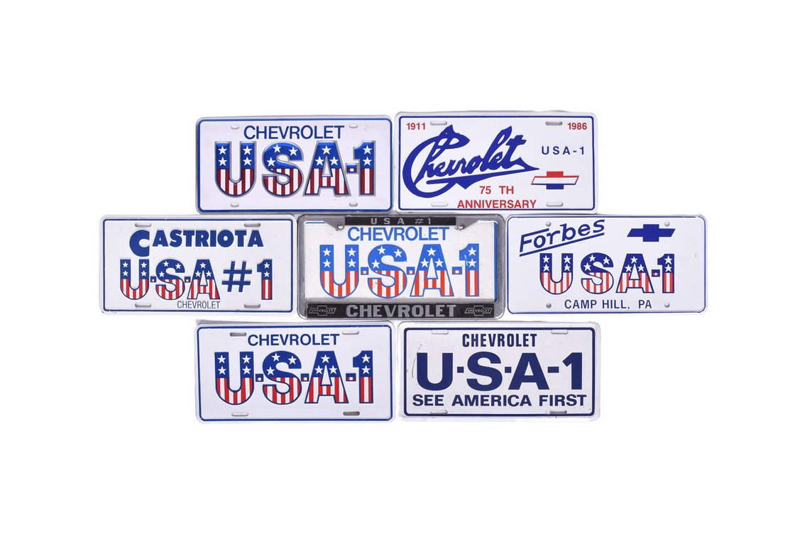 Group of Chevrolet Car License Plate Inserts and Frame