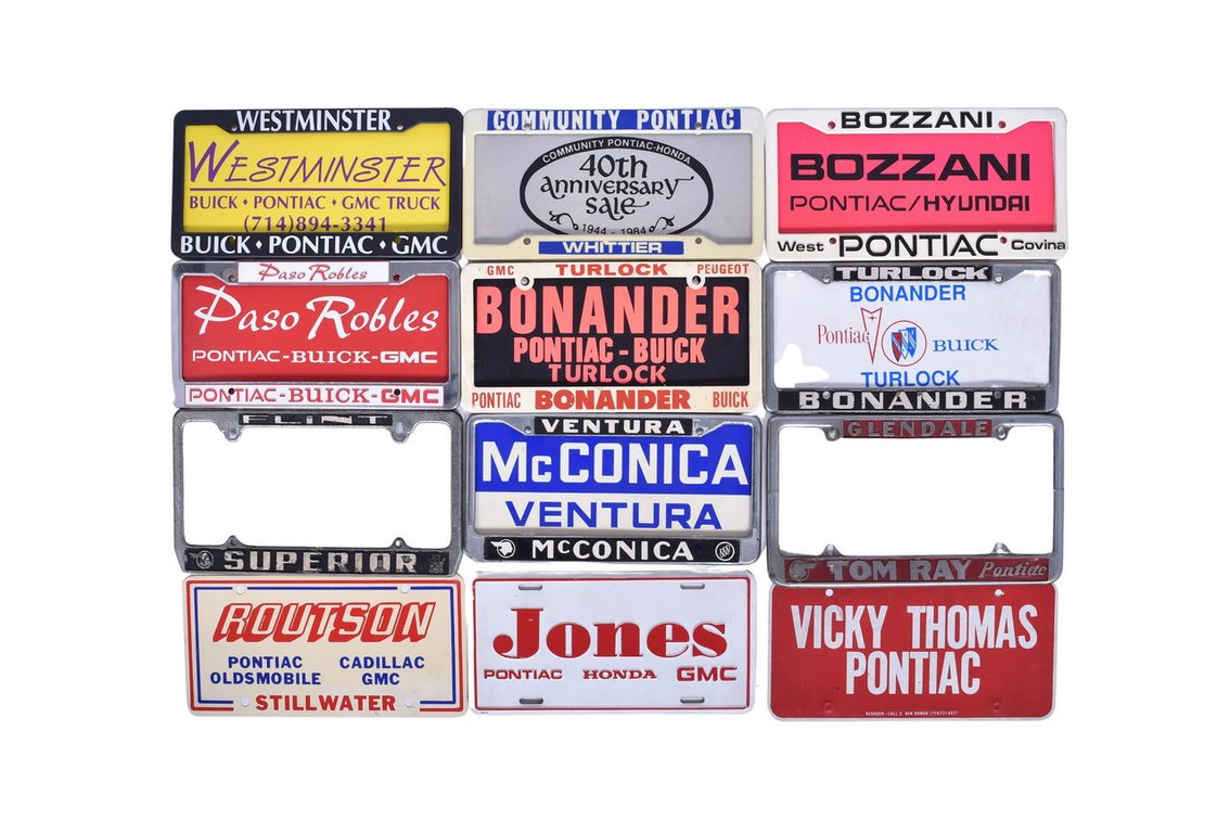 Nine Pontiac Car Dealership Advertising License Plate Frames and Ten Inserts