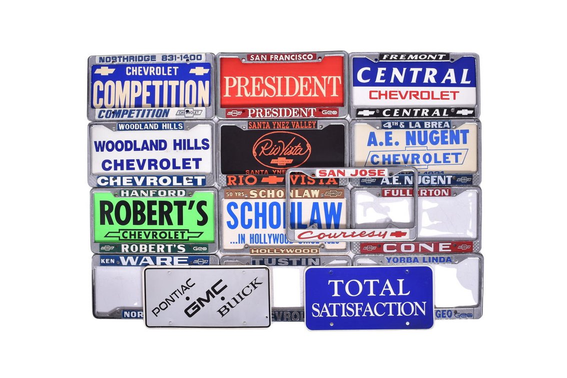Thirteen Chevrolet Car Dealership Advertising Metal License Plate Frames and Ten Inserts