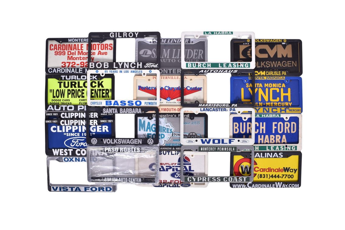 Twenty-One Plastic License Plate Frames - Dealerships Ford, Chrylser, Volkswagen and More