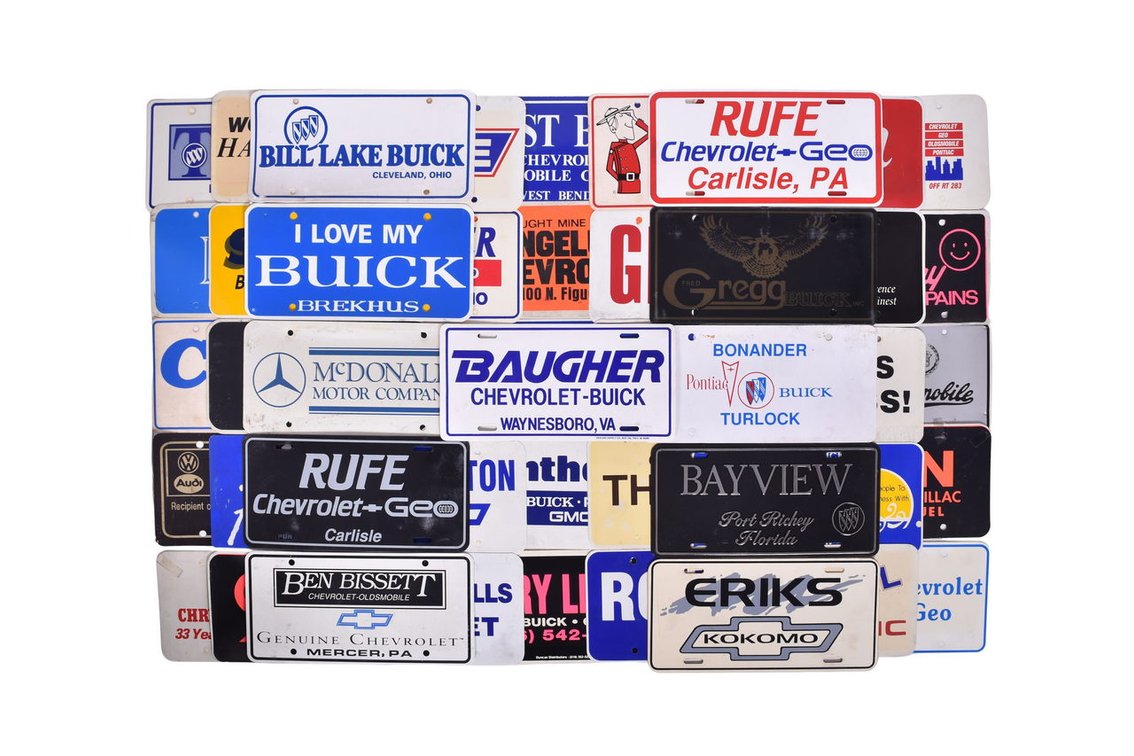 Forty Eight Car Dealership Plastic License Plate Inserts - Chevrolet, Geo, Pontiac, Buick, Plymouth, Volkswagen, Ford, Cadillac, Oldsmobile, and more