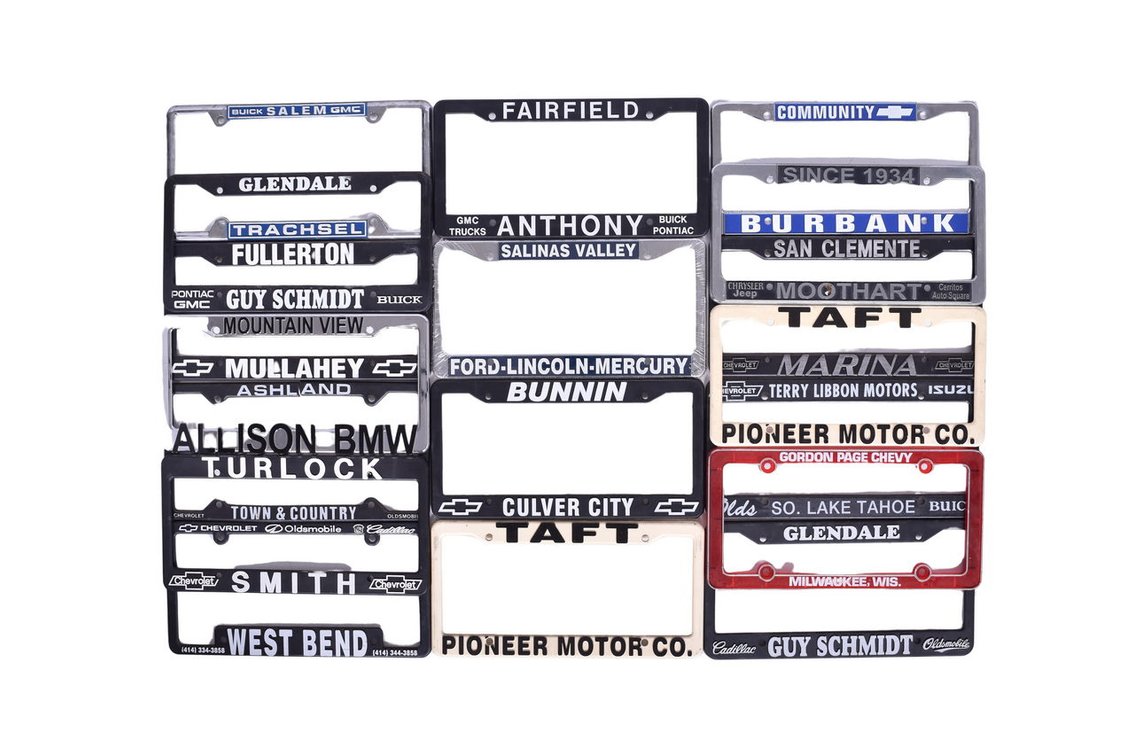 Eighteen Plastic License Plate Frames - Dealerships Chevrolet, Buick, and More