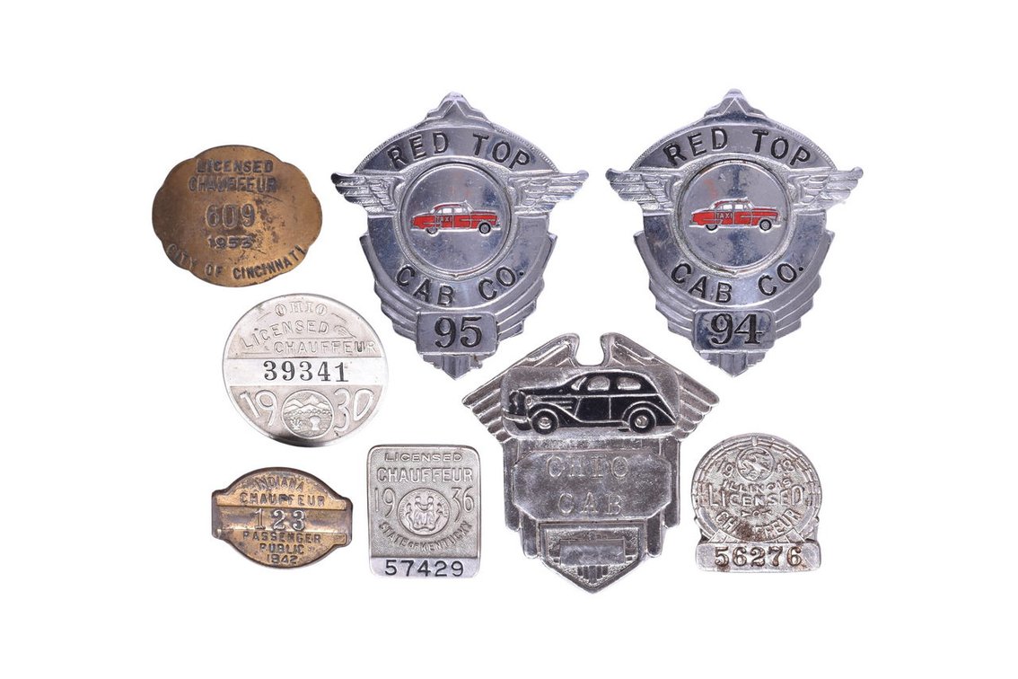 Group of Eight Taxi Cab Driver and Chauffeur Hat Badges 1930s-1950s