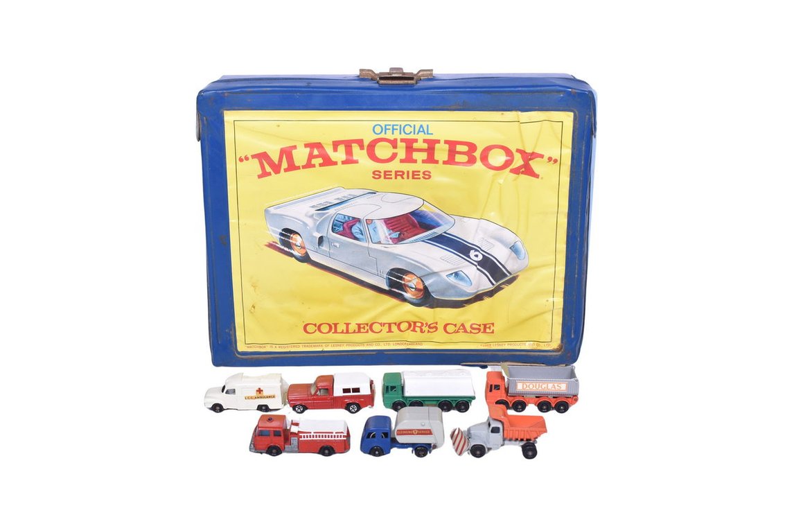 Seven Matchbox / Lesney Trucks and Collector's Case - No. 6 Ford, No. 32 Leyland, No. 29 Fire Pumper, No. 14 Lomas, No. 16 Scammell, No. 15 Tippax, No. 51 Tipper