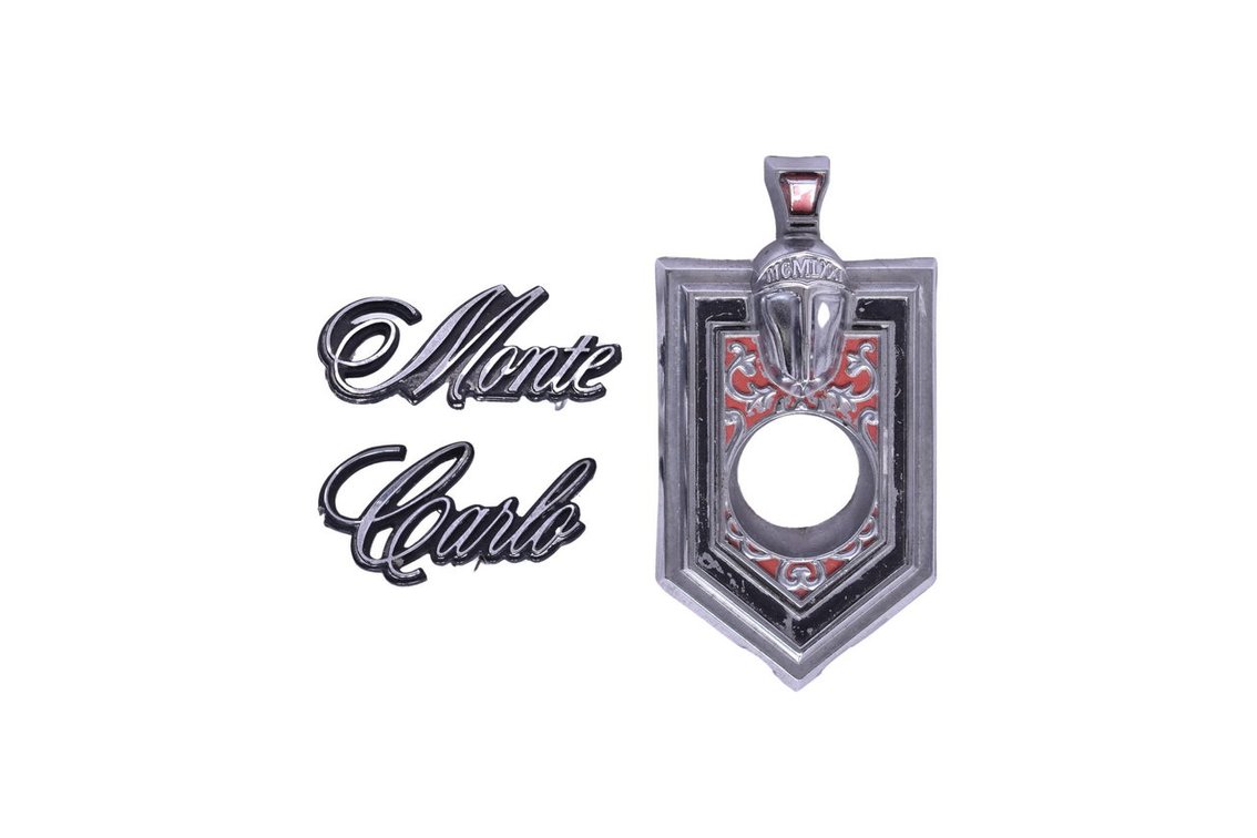 Chevrolet Monte Carlo Trunk Lock Bezel and Script Emblem