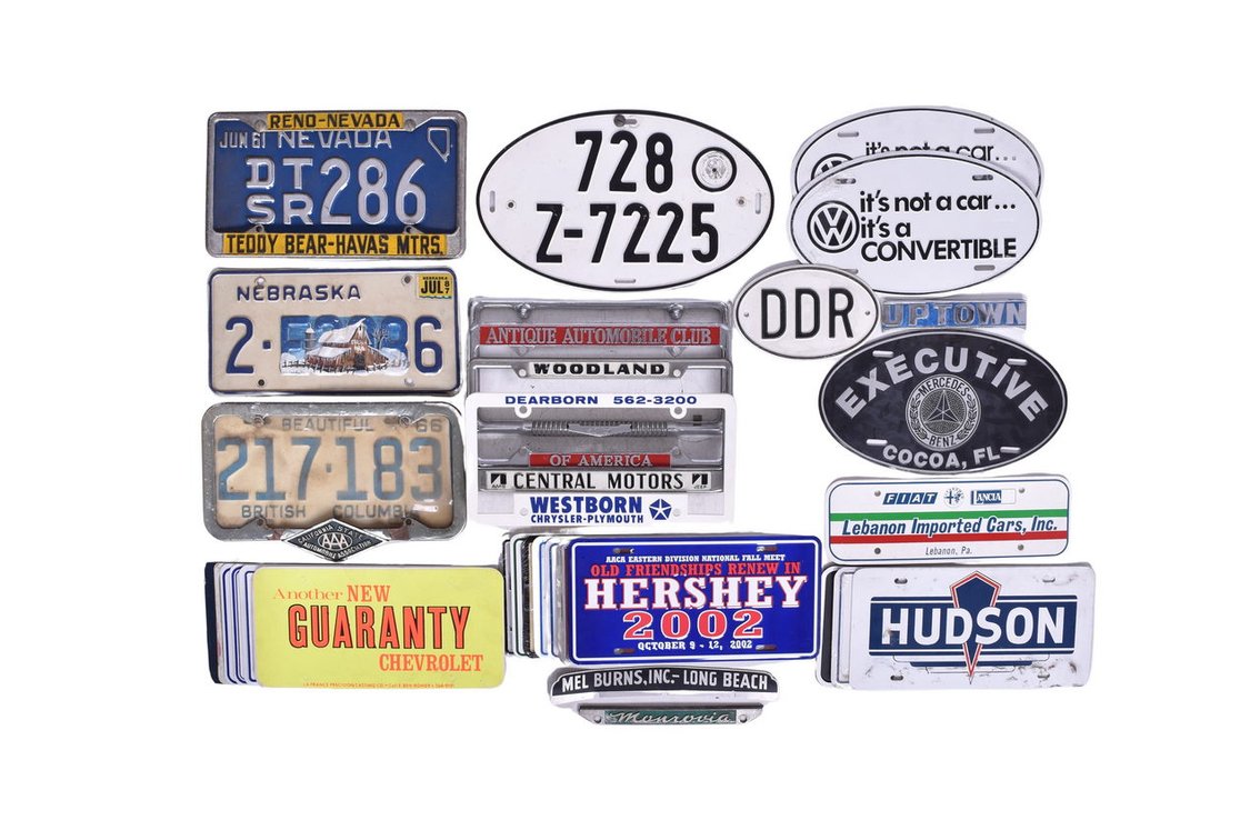Group of Automobile License Plates, Frames, and Inserts