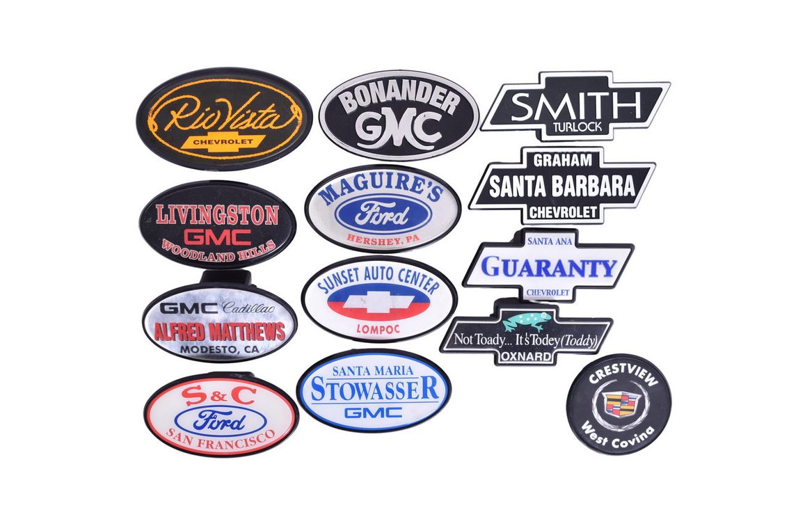 Thirteen Plastic Trailer Hitch Covers / Dust Caps - Chevrolet, Cadillac, GMC Dealerships