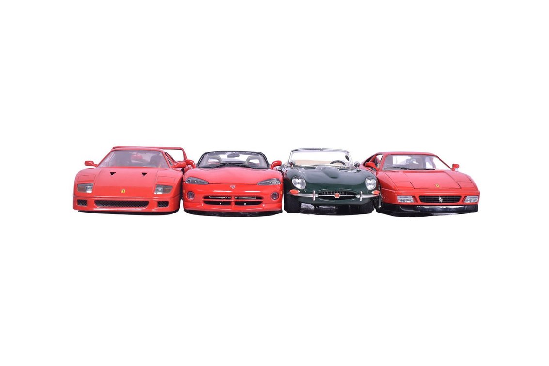 Four Burago 1:18 Scale Die Cast Model Cars - 1989 Ferrari, 1961 Jaguar, 1987 Ferrari, Dodge Viper RT/10
