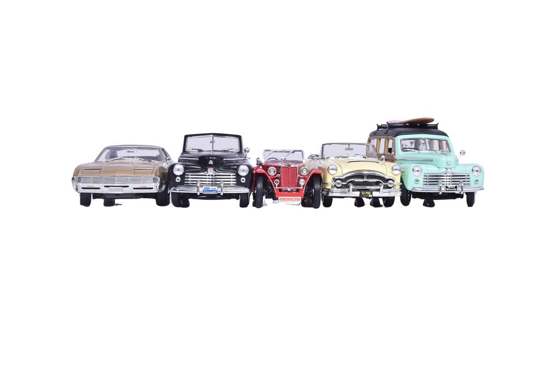 Five Road Signature 1:18 Scale Models - 1948 Ford Woody, 1953 Packard, 1966 Oldsmobile, and More
