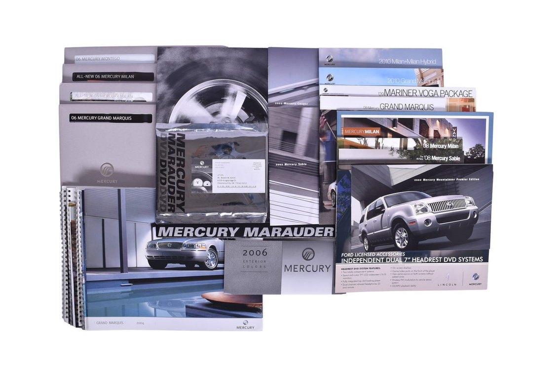 Thirty-Three Pieces Of Lincoln-Mercury 2000's Promotional And Sales Literature- Four Sealed Lincoln Dealer 2006 Brochures, Accessories Booklet, etc.