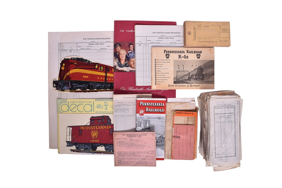 Pieces of Pennsylvania Railroad Ephemera-Over One Hundred Filled Out Injury Reports from the 1940's and 1950's, Two Decorative Decals, Public Timetables From 1956, etc.