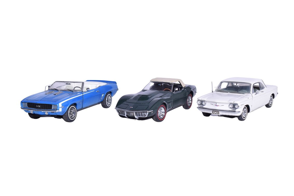 Three 1:24 Die Cast 1960s Chevrolet Models - Corvair, Corvette, Camaro - Danbury Mint & Franklin Mint