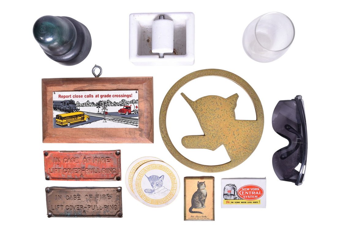 Mixed Railroad Memorabilia Group Of Ten Items- Brass Chesapeake & Ohio Trivet, Stamp Moistener, New Hope & Ivyland Railroad Glass, Pennsylvania Railroad Glass Insulator, Chessie Kitten Coasters, Etc.