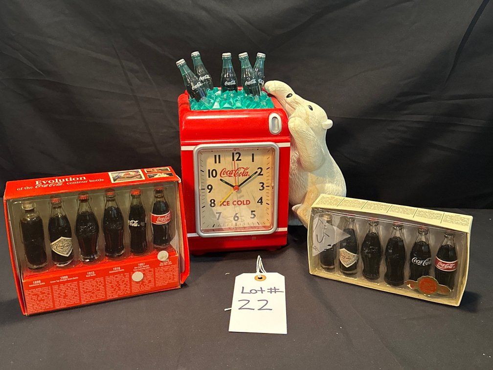 Coca-Cola Clock and Evolution Coke bottles 