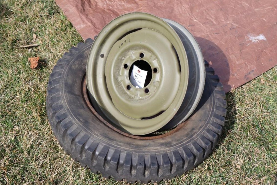 Army Jeep Rim and Tire (Rim does have a slight bend, good for a spare)