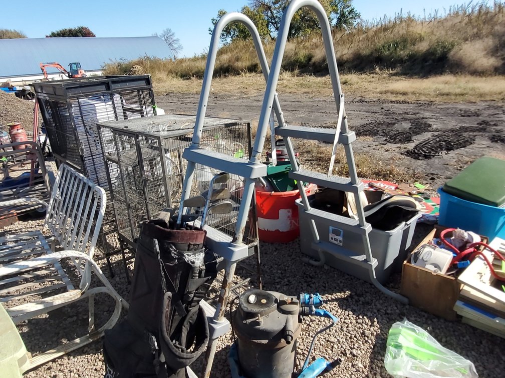 Pool ladder, pump, golf clubs