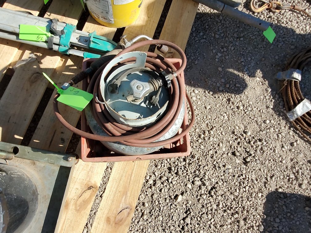 Propane tank and Torch.