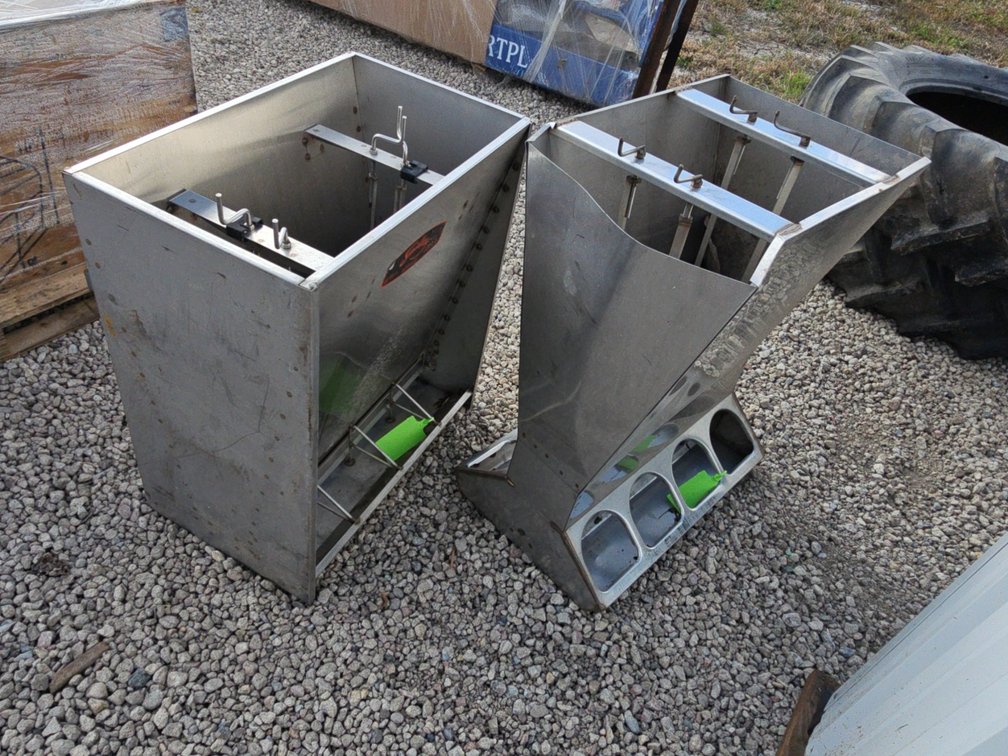 2 stainless hog feeders