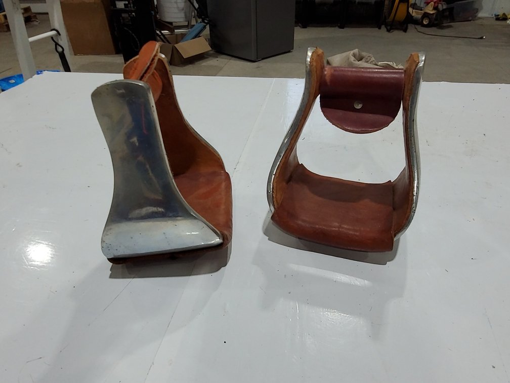 Aluminum covered bell stirrups