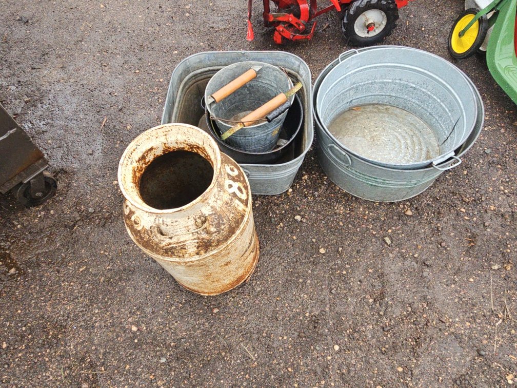 Milk jug and old buckets