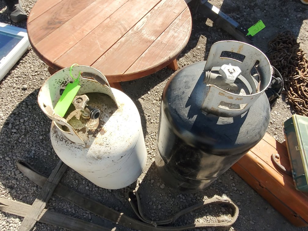 (2) large propane tanks