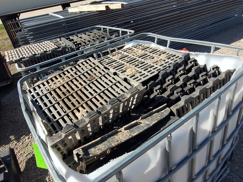 (2) crates of plastic hog flooring