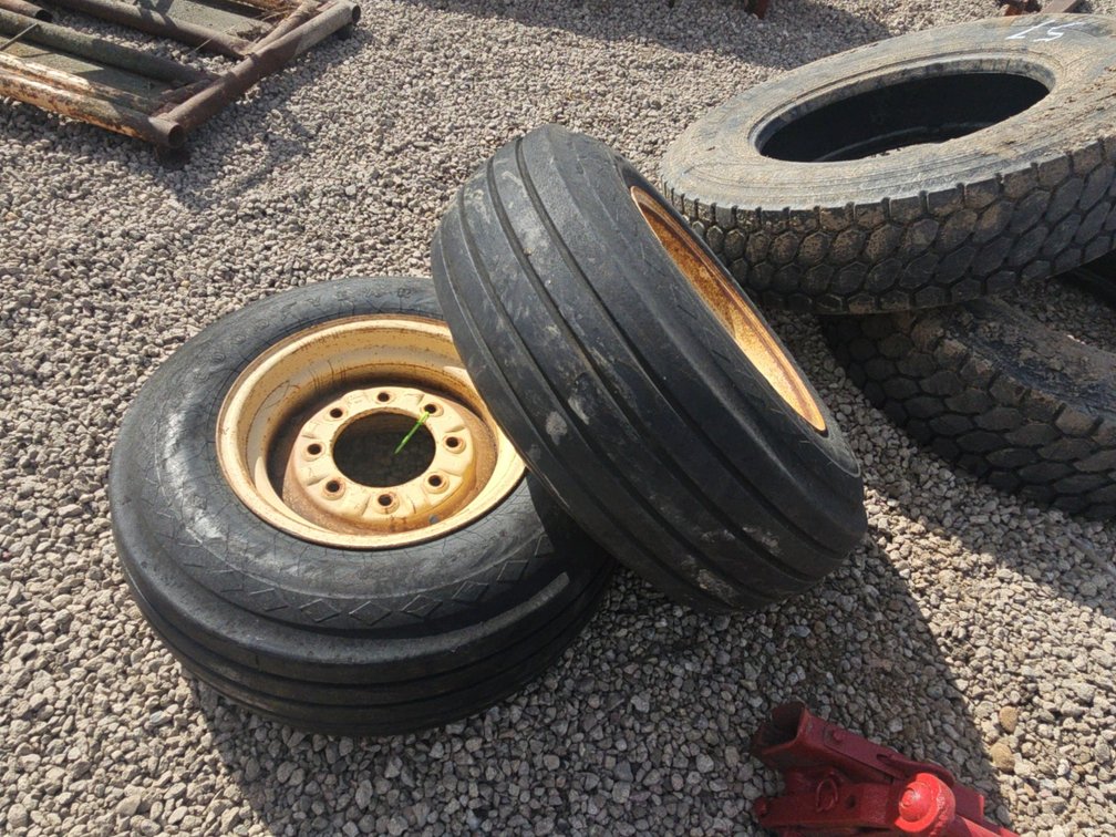2- 11L16 rims and tires