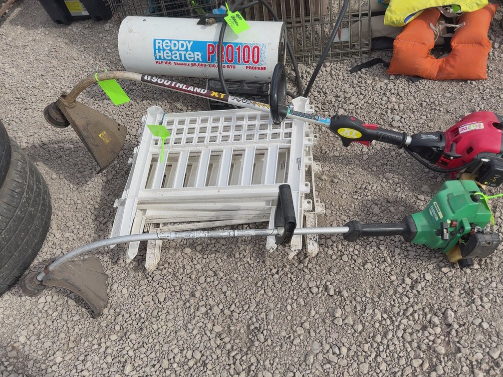 Plastic fencing, two gas weedeaters