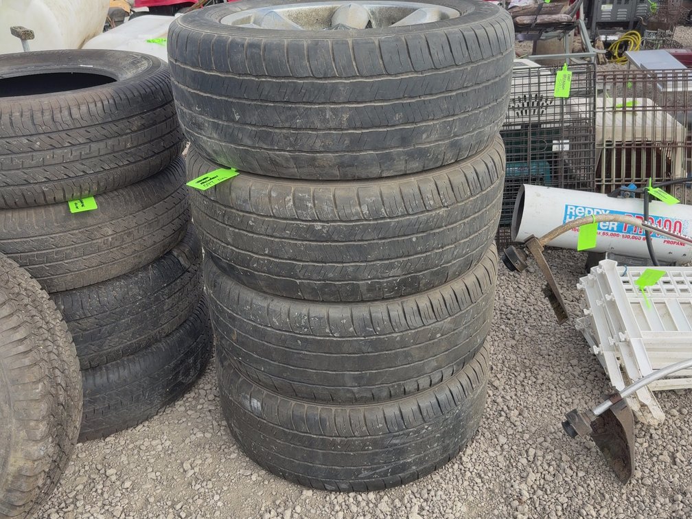 Four tires and rims