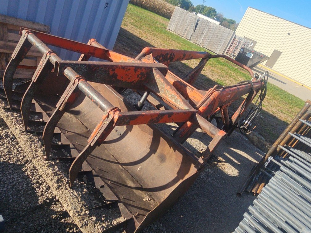 Dual loader and grapple